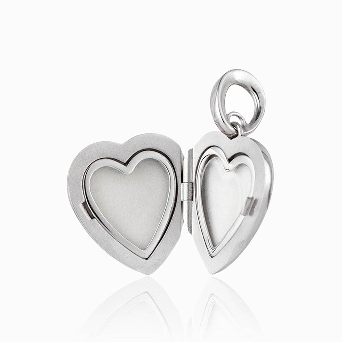 Open view of an 18 ct petitie white gold heart locket