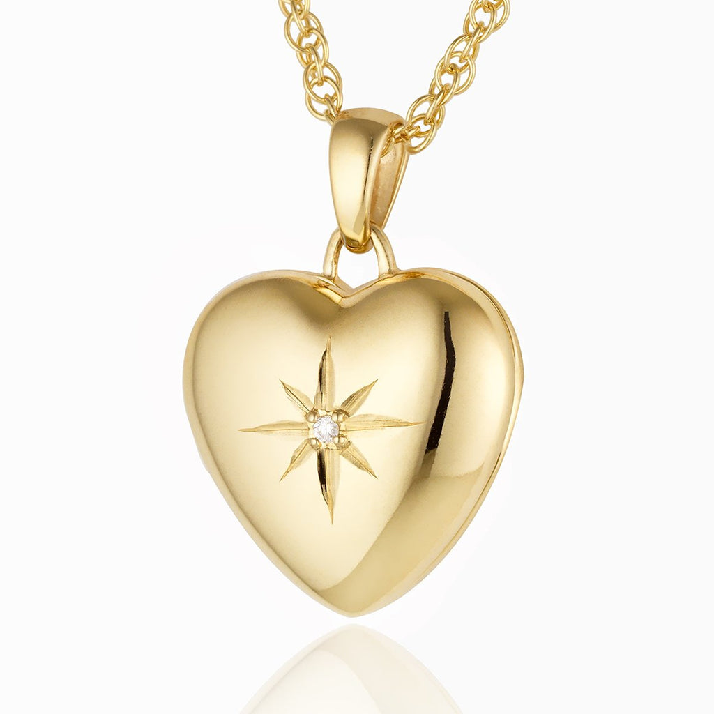 a 9 ct gold heart locket set with a diamond on a 9 ct gold rope chain.
