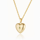 9 ct gold heart locket seti with a central emerald, on a 9ct gold rope chain