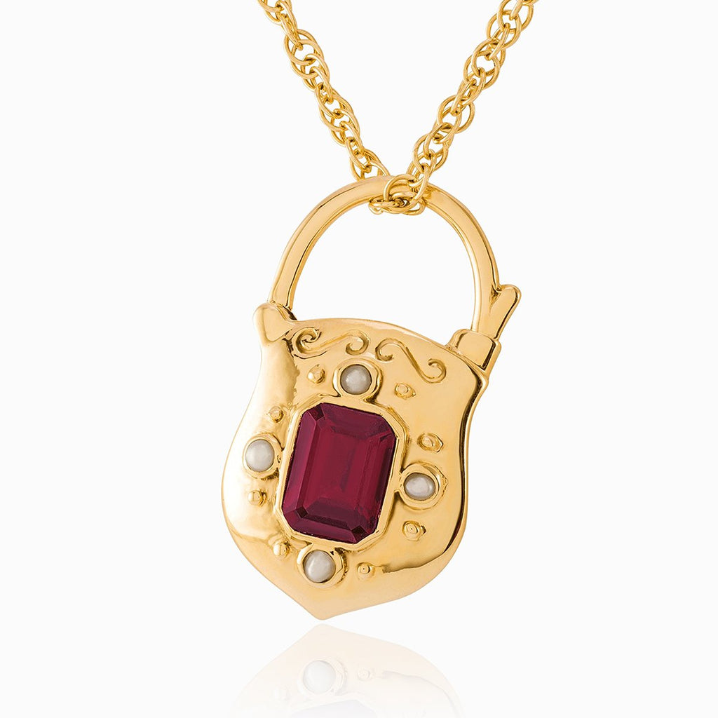 9 ct gold padlock locket set with seed pearls and a red garnet on a 9 ct gold rope chain