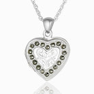 Sterling silver 925 heart locket with marcasite stone settings.