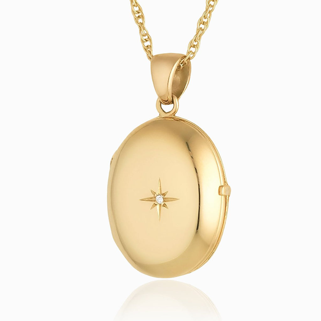 9 ct gold 4-photo oval locket set with a diamond on a 9 ct gold rope chain