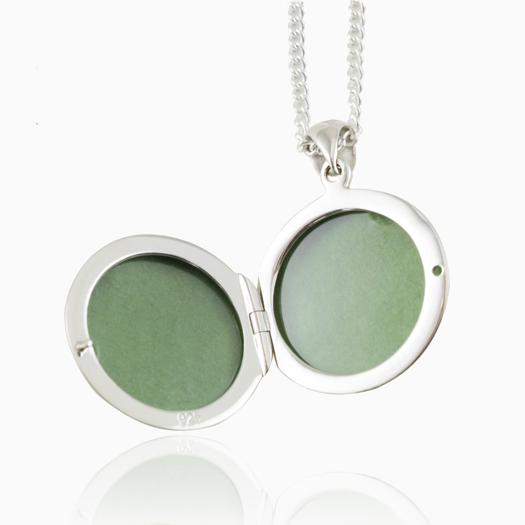 Product title: Contemporary White Gold Peridot Locket, product type: Locket