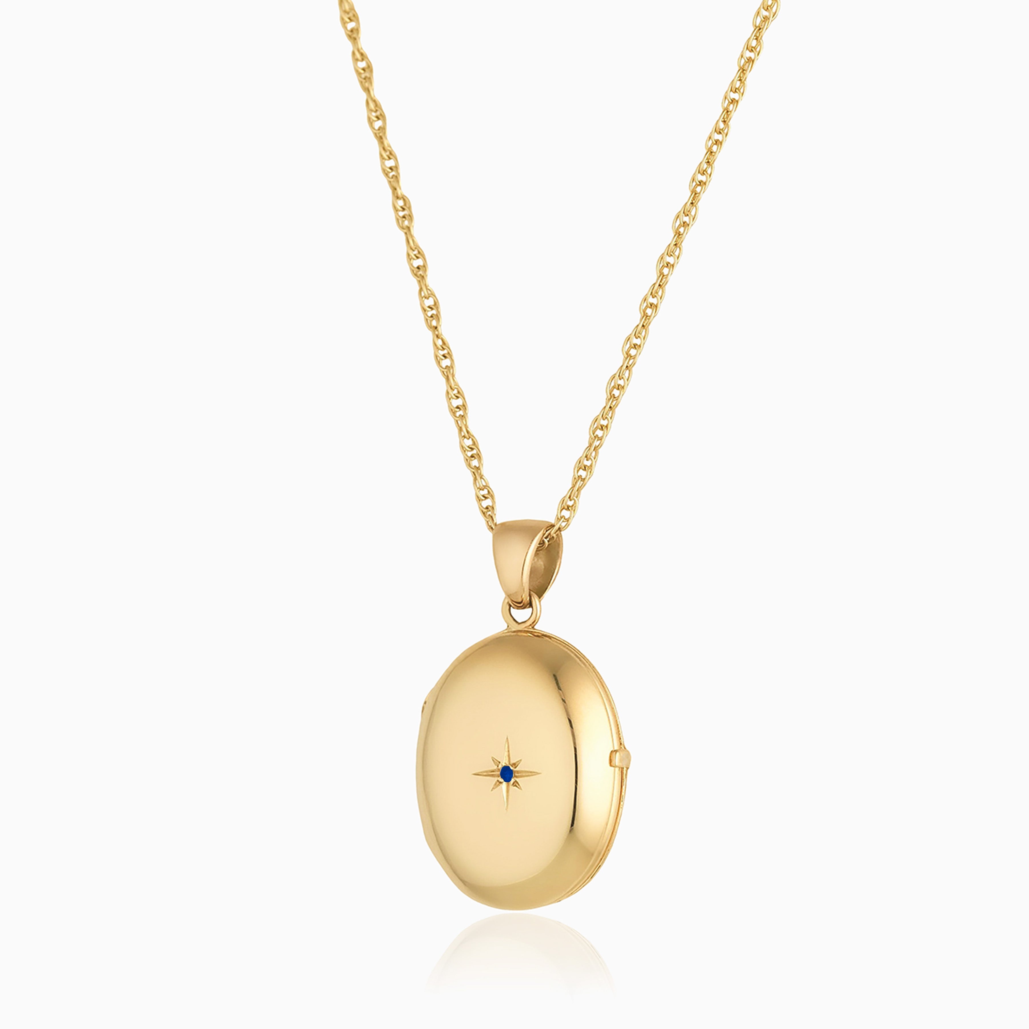 Product title: Dainty Gold Sapphire 4-Photo Locket, product type: Necklaces