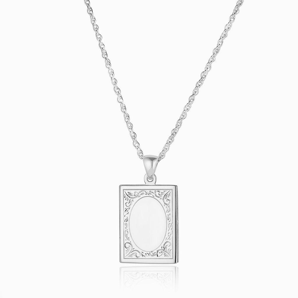 Rectangle sterling silver 925 locket with hand engraved design.
